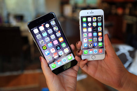 Apple bội thu nhờ iPhone mới ảnh 1
